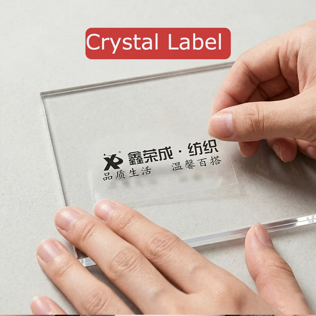 crystal label applied on acrylic surface with clear glossy finish and strong adhesion